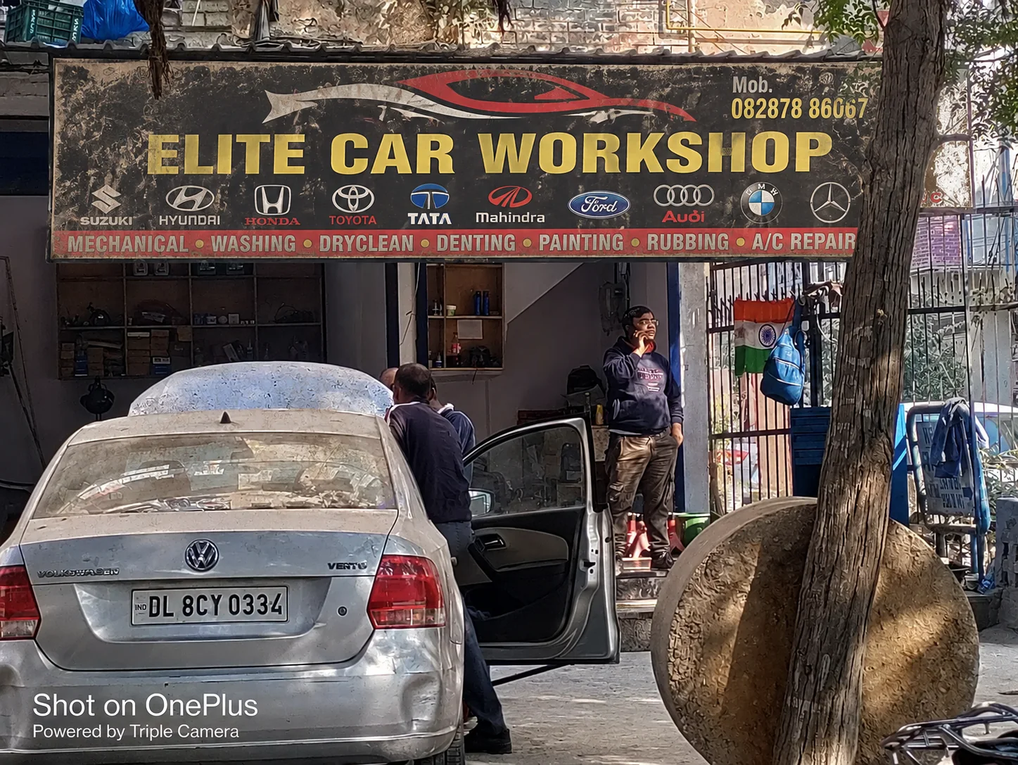 Elite Car Workshop storefront at Udyog Vihar Phase 1, Gurugram, Haryana, IN, 122016